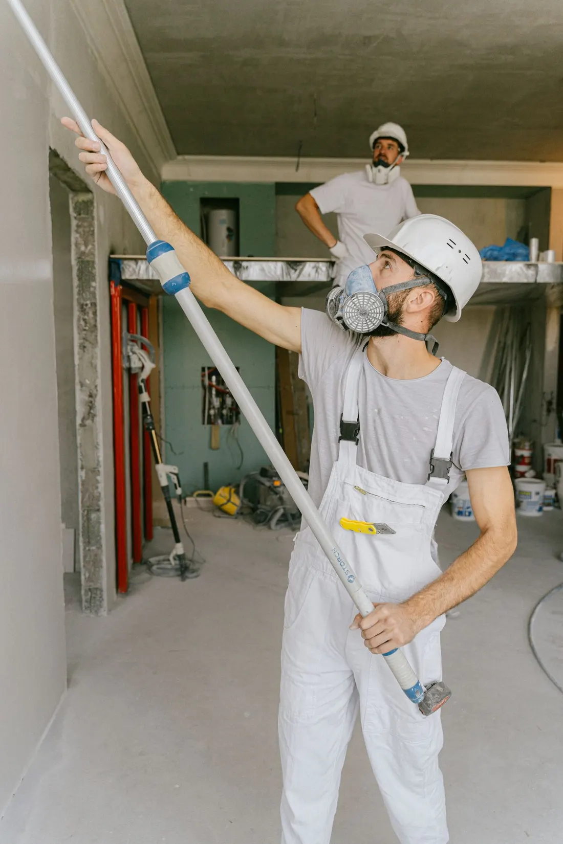 Illustrative photo of painters working indoors